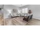 Bright living room with neutral paint, modern furniture, and a decorative area rug at 704 E Gemini Pl, Chandler, AZ 85249