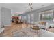 Bright living room with an open layout to the dining area and kitchen, great for entertaining at 704 E Gemini Pl, Chandler, AZ 85249