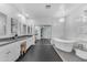 Sleek bathroom with double vanity, a soaking tub, and modern finishes at 704 E Gemini Pl, Chandler, AZ 85249