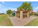 Picnic area with covered ramada is perfect for picnics and Gathering events at the community park at 704 E Gemini Pl, Chandler, AZ 85249
