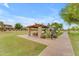 Picnic area with covered ramada is perfect for picnics and Gathering events at the community park at 704 E Gemini Pl, Chandler, AZ 85249