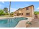 Backyard pool and patio are great for outdoor living and entertaining in the spacious yard at 704 E Gemini Pl, Chandler, AZ 85249
