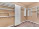 Organized walk-in closet with built-in shelves and ample storage at 704 E Gemini Pl, Chandler, AZ 85249