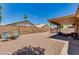 Backyard featuring seating, a patio, and a trampoline at 7346 E Naranja Ave, Mesa, AZ 85209
