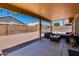 Cozy covered patio featuring outdoor seating and cafe lights at 7346 E Naranja Ave, Mesa, AZ 85209