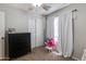 Cozy bedroom featuring carpet floors, neutral walls, and a closet for storage at 7346 E Naranja Ave, Mesa, AZ 85209
