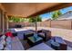Outdoor patio area featuring comfortable seating and string lights, perfect for entertaining or relaxing at 7346 E Naranja Ave, Mesa, AZ 85209