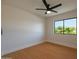 Bedroom with wood floors and a ceiling fan offers plenty of natural light at 749 E Montebello Ave # 231, Phoenix, AZ 85014