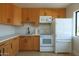 Well-lit kitchen features ample cabinet space, modern appliances, and plenty of counter space at 749 E Montebello Ave # 231, Phoenix, AZ 85014