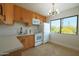 Bright, updated kitchen with modern appliances and a large window overlooking the outdoors at 749 E Montebello Ave # 231, Phoenix, AZ 85014