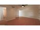 Bright living room with wood floors, ceiling fan and view of the bathroom at 749 E Montebello Ave # 231, Phoenix, AZ 85014