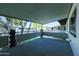 Large covered patio for outdoor living, overlooking serene community landscaping at 749 E Montebello Ave # 231, Phoenix, AZ 85014