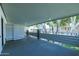 Spacious covered patio with views of mature trees and community grounds at 749 E Montebello Ave # 231, Phoenix, AZ 85014