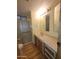 Bathroom with a tub shower and neutral colored walls at 7654 E Calypso Ave, Mesa, AZ 85208