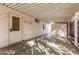Spacious carport with access doors at 7654 E Calypso Ave, Mesa, AZ 85208