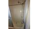 Shower stall features a hand-held shower head at 7654 E Calypso Ave, Mesa, AZ 85208