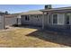 Spacious backyard with a covered patio and block wall at 822 W El Alba Way, Chandler, AZ 85225