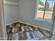 Bright bedroom with natural light, freshly painted walls, and new multi-tone wood-look flooring at 822 W El Alba Way, Chandler, AZ 85225