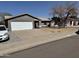 Single-story home featuring a two-car garage, neutral paint, and a well-maintained front yard on a sunny day at 822 W El Alba Way, Chandler, AZ 85225