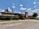 The Peoria Pines Golf & Restaurant is an attractive building with landscaping around it at 8402 N 105Th Ln, Peoria, AZ 85345