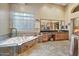 Bathroom features a walk-in shower and tub with granite countertops at 8526 E Hackamore Dr, Scottsdale, AZ 85255