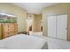Neutral-toned bedroom featuring access to an en suite bath and a closet at 8526 E Hackamore Dr, Scottsdale, AZ 85255