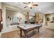 Spacious billiards room featuring a pool table, decorative columns and access to other rooms at 8526 E Hackamore Dr, Scottsdale, AZ 85255