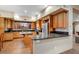 Spacious kitchen features wood cabinets, granite countertops, and stainless steel appliances at 8526 E Hackamore Dr, Scottsdale, AZ 85255