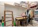 Small closet with storage bins and a desk for working at home at 9231 W Bent Tree Dr, Peoria, AZ 85383