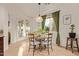 Cozy dining area featuring a round table and views of the backyard at 9231 W Bent Tree Dr, Peoria, AZ 85383