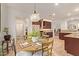 Breakfast nook with round table near the kitchen, featuring a pendant light at 9231 W Bent Tree Dr, Peoria, AZ 85383
