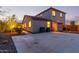 Back of house with long driveway at 9231 W Bent Tree Dr, Peoria, AZ 85383