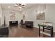 Spacious living area featuring hardwood floors and plenty of natural light at 9231 W Bent Tree Dr, Peoria, AZ 85383