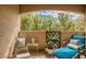 Relaxing balcony with furniture and view of the surrounding landscape at 9550 E Thunderbird Rd # 259, Scottsdale, AZ 85260