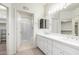 Bright bathroom with double sinks, modern fixtures, and a walk-in shower at 9550 E Thunderbird Rd # 259, Scottsdale, AZ 85260