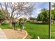 Community outdoor cooking area with shared barbecue grills and picnic area at 9550 E Thunderbird Rd # 259, Scottsdale, AZ 85260