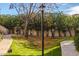 Well-maintained community grounds with lush greenery, trees, and walkways at 9550 E Thunderbird Rd # 259, Scottsdale, AZ 85260