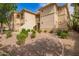 Beautiful condominium exterior with well-maintained landscaping and neutral color palette at 9550 E Thunderbird Rd # 259, Scottsdale, AZ 85260