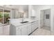 Open-concept kitchen featuring stainless steel appliances and a convenient breakfast bar at 9550 E Thunderbird Rd # 259, Scottsdale, AZ 85260