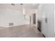 Light-filled living room with hardwood flooring and views of the kitchen and fireplace at 9550 E Thunderbird Rd # 259, Scottsdale, AZ 85260