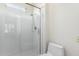 Modern shower featuring white subway tile, glass doors, and chrome fixtures at 9550 E Thunderbird Rd # 259, Scottsdale, AZ 85260