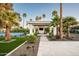 Well-manicured backyard with entertainment area and pool at 9733 E Clinton St, Scottsdale, AZ 85260