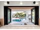Backyard view showing a pool and outdoor space, accessible from the kitchen at 9733 E Clinton St, Scottsdale, AZ 85260