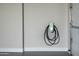 Tesla electric car charging station installed in a residential garage at 9733 E Clinton St, Scottsdale, AZ 85260