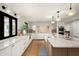 Spacious kitchen showcases sleek cabinetry, countertops, and modern fixtures at 9733 E Clinton St, Scottsdale, AZ 85260