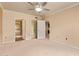 Bedroom featuring a closet and ensuite bathroom at 10330 W Thunderbird W Blvd # B103, Sun City, AZ 85351