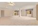 Large living room with great natural light and outdoor views at 10330 W Thunderbird W Blvd # B103, Sun City, AZ 85351