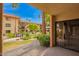 This patio features a wonderful view of the community grounds, landscaping and buildings at 10330 W Thunderbird W Blvd # B103, Sun City, AZ 85351