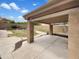 The backyard features a covered patio with a spacious yard at 1078 E Poncho Ln, San Tan Valley, AZ 85143