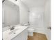 Clean bathroom features a vanity with sink, toilet, and a shower-tub combination at 1078 E Poncho Ln, San Tan Valley, AZ 85143